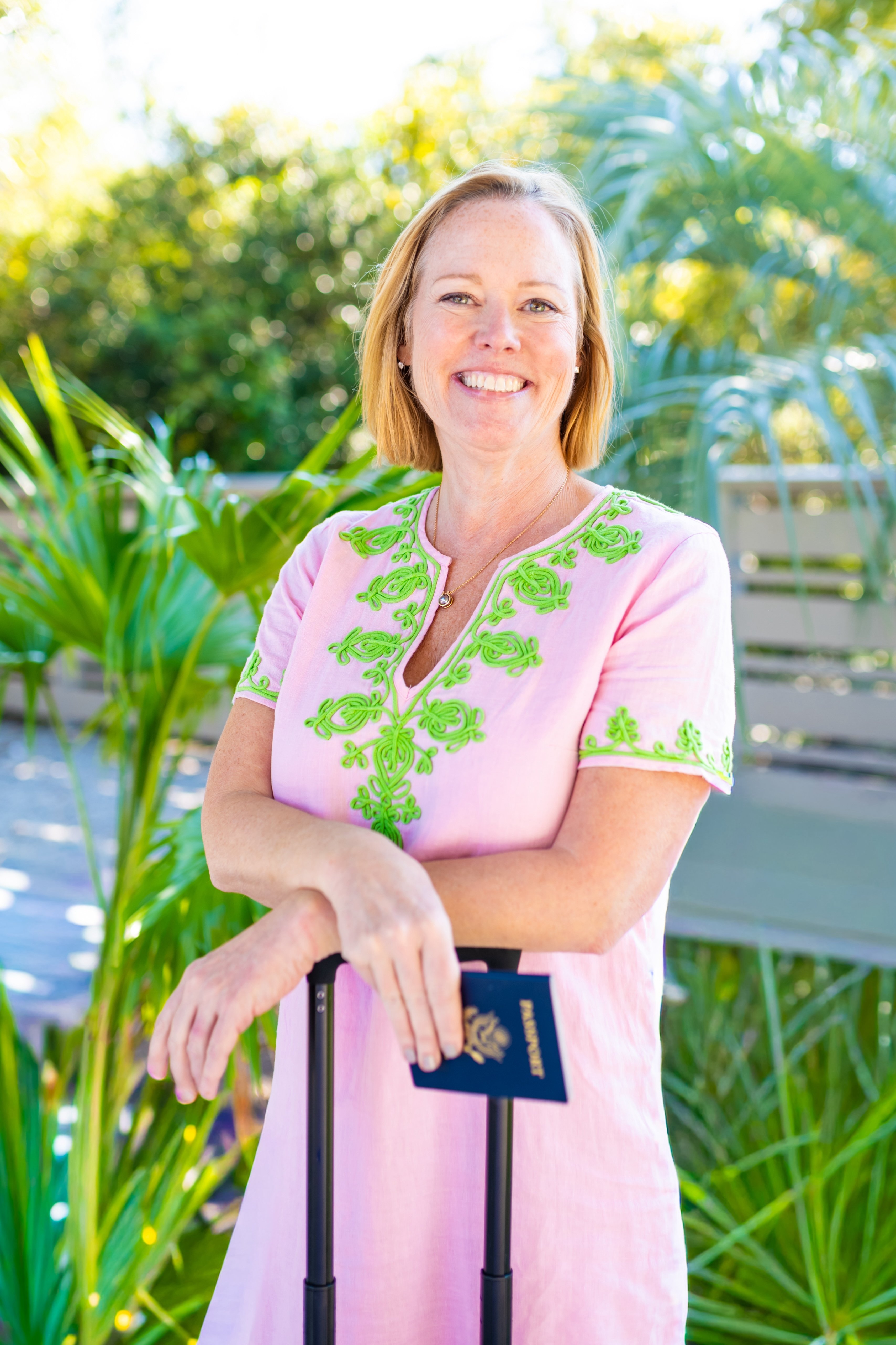 Colleen Finger, travel strategist, smiling portrait photo